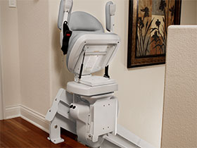 Bruno Elite curved stairlift fold up at top of the steps