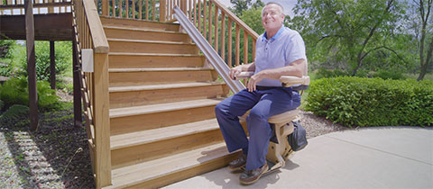 Bruno straight stair lift on carpeted staircase in a home